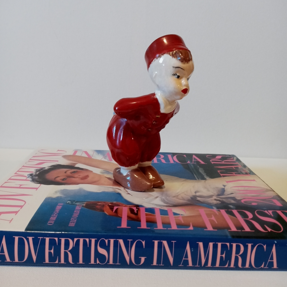 Circa 1930's, Bellhop figurine, 6 inches tall, red, vintage white